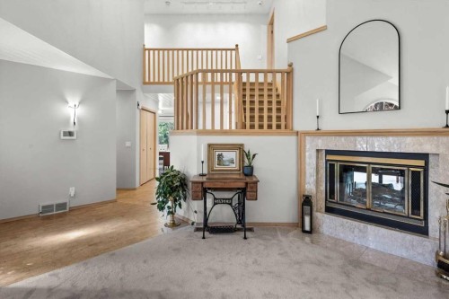 75 Hawkside Close Nw, Calgary, AB - Indoor With Fireplace