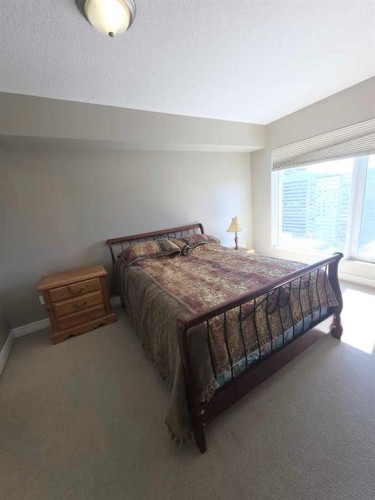 2208-910 5 Avenue Sw, Calgary, AB - Indoor Photo Showing Bedroom