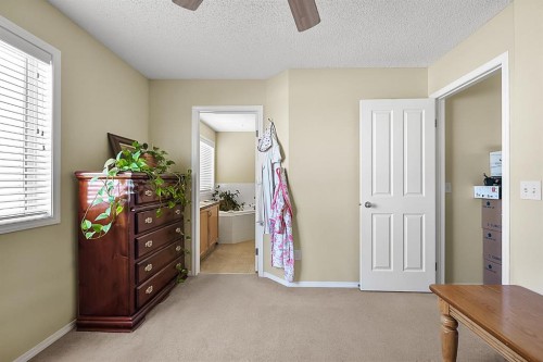 13 Tuscany Ridge Mews Nw, Calgary, AB - Indoor Photo Showing Other Room