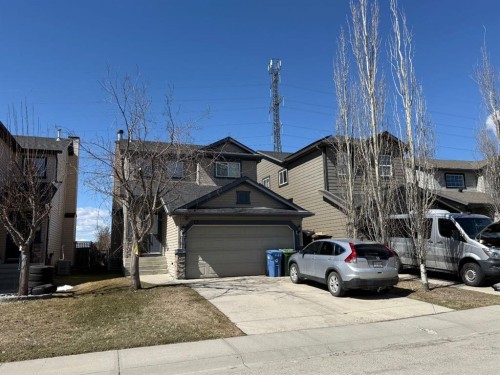 13 Tuscany Ridge Mews Nw, Calgary, AB - Outdoor With Facade