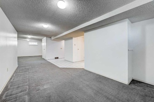 48 Westover Drive Sw, Calgary, AB - Indoor Photo Showing Other Room
