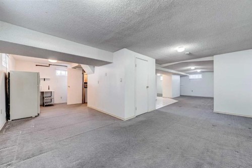 48 Westover Drive Sw, Calgary, AB - Indoor Photo Showing Other Room