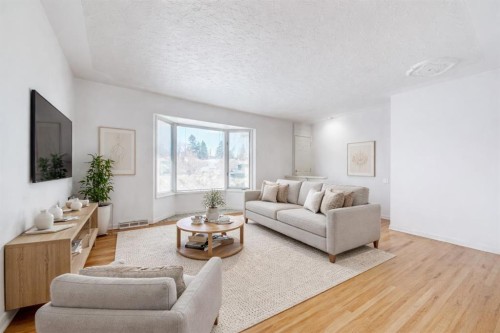 48 Westover Drive Sw, Calgary, AB - Indoor Photo Showing Living Room