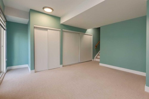 318 Hawkstone Manor Nw, Calgary, AB - Indoor Photo Showing Other Room