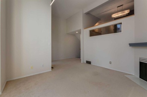 318 Hawkstone Manor Nw, Calgary, AB - Indoor Photo Showing Other Room