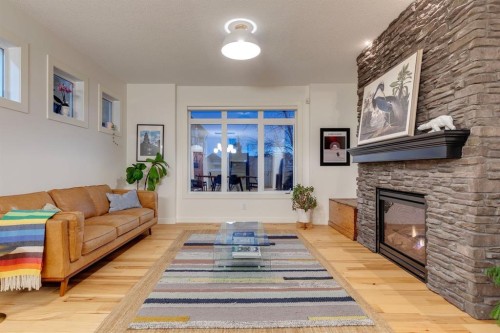 29 Aspenshire Crescent Sw, Calgary, AB - Indoor Photo Showing Living Room With Fireplace