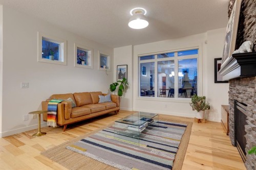 29 Aspenshire Crescent Sw, Calgary, AB - Indoor Photo Showing Living Room With Fireplace