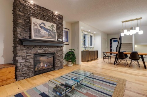 29 Aspenshire Crescent Sw, Calgary, AB - Indoor Photo Showing Living Room With Fireplace