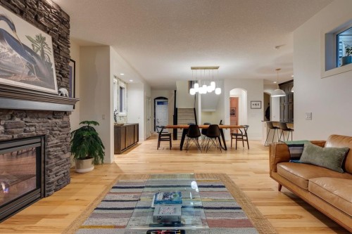 29 Aspenshire Crescent Sw, Calgary, AB - Indoor Photo Showing Living Room With Fireplace