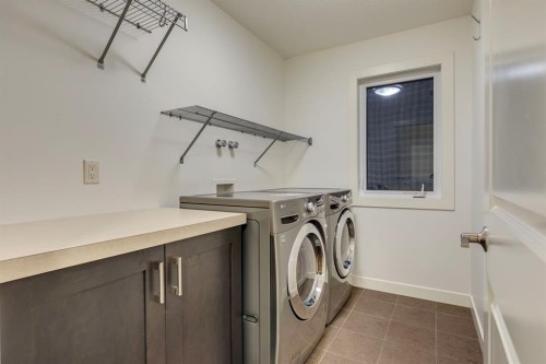 29 Aspenshire Crescent Sw, Calgary, AB - Indoor Photo Showing Laundry Room