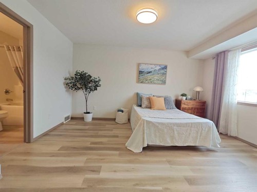 22 Arthur Close, Red Deer, AB - Indoor Photo Showing Bedroom