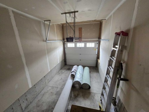 22 Arthur Close, Red Deer, AB - Indoor Photo Showing Garage