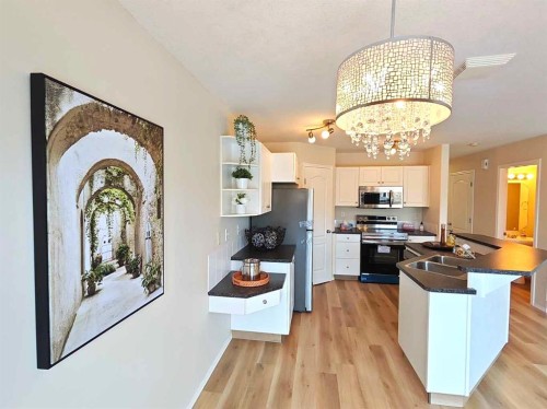 22 Arthur Close, Red Deer, AB - Indoor Photo Showing Kitchen With Double Sink