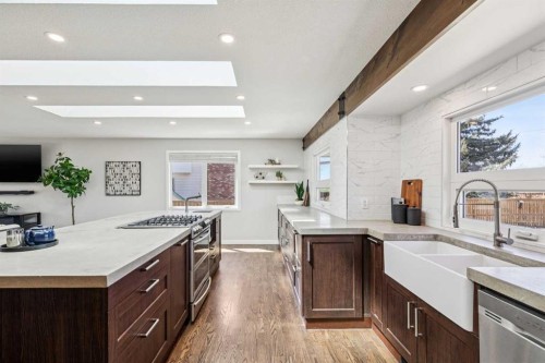 69 Suntree Lane, Okotoks, AB - Indoor Photo Showing Kitchen With Double Sink With Upgraded Kitchen