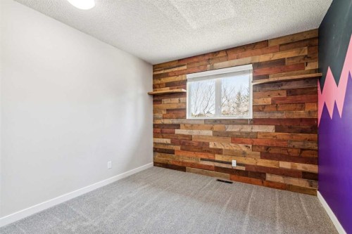 69 Suntree Lane, Okotoks, AB - Indoor Photo Showing Other Room