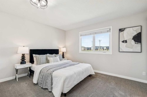 69 Suntree Lane, Okotoks, AB - Indoor Photo Showing Bedroom