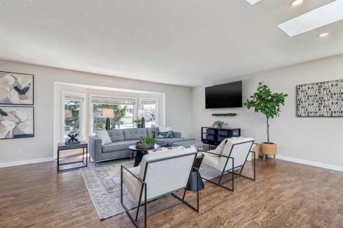 69 Suntree Lane, Okotoks, AB - Indoor Photo Showing Living Room With Fireplace