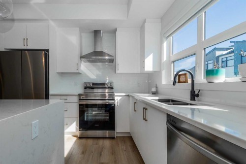 897 Mahogany Boulevard Se, Calgary, AB - Indoor Photo Showing Kitchen With Double Sink With Upgraded Kitchen