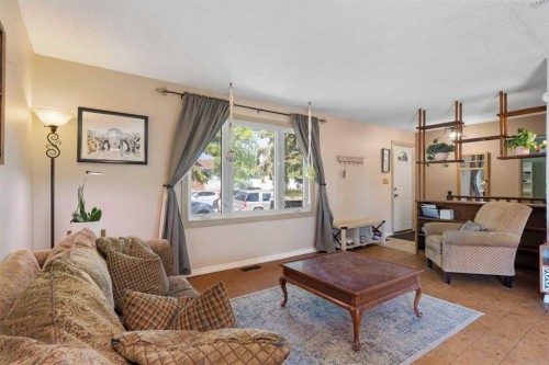 4609 Marcombe Way Ne, Calgary, AB - Indoor Photo Showing Living Room