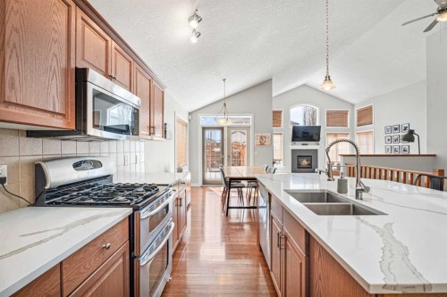 611 Cavendish Beach Bay, Chestermere, AB - Indoor Photo Showing Kitchen With Double Sink With Upgraded Kitchen