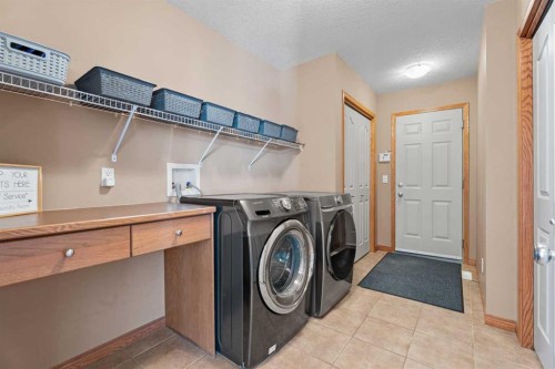 611 Cavendish Beach Bay, Chestermere, AB - Indoor Photo Showing Laundry Room