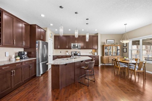 211 Mountainview Drive, Okotoks, AB - Indoor Photo Showing Kitchen With Stainless Steel Kitchen With Upgraded Kitchen