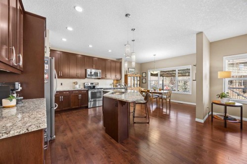 211 Mountainview Drive, Okotoks, AB - Indoor Photo Showing Kitchen With Stainless Steel Kitchen With Upgraded Kitchen