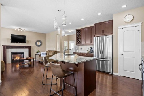 211 Mountainview Drive, Okotoks, AB - Indoor Photo Showing Kitchen With Stainless Steel Kitchen With Upgraded Kitchen