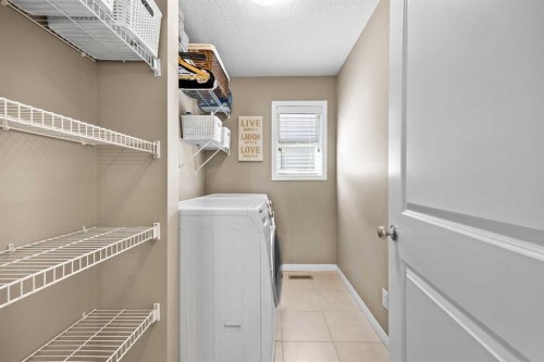 211 Mountainview Drive, Okotoks, AB - Indoor Photo Showing Laundry Room