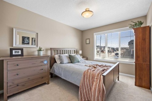 211 Mountainview Drive, Okotoks, AB - Indoor Photo Showing Bedroom