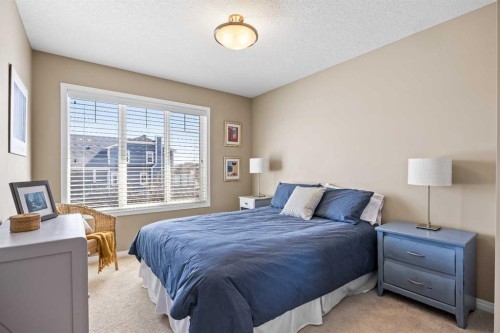 211 Mountainview Drive, Okotoks, AB - Indoor Photo Showing Bedroom