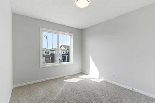 623 Buffaloberry Manor Se, Calgary, AB - Indoor Photo Showing Other Room