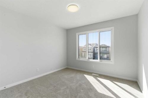 623 Buffaloberry Manor Se, Calgary, AB - Indoor Photo Showing Other Room