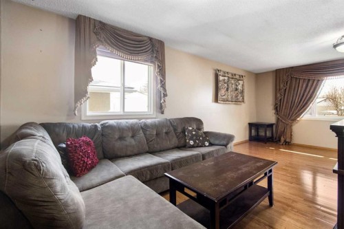 1108 Marcombe Crescent Ne, Calgary, AB - Indoor Photo Showing Living Room