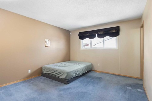 1108 Marcombe Crescent Ne, Calgary, AB - Indoor Photo Showing Bedroom