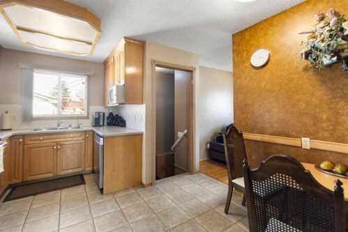 1108 Marcombe Crescent Ne, Calgary, AB - Indoor Photo Showing Kitchen With Double Sink