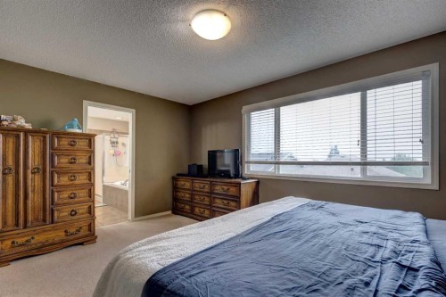 587 Everbrook Way Sw, Calgary, AB - Indoor Photo Showing Bedroom