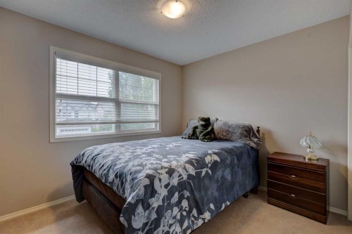 587 Everbrook Way Sw, Calgary, AB - Indoor Photo Showing Bedroom