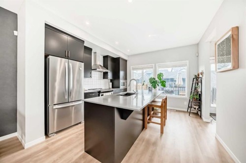 19 Rowley Common Nw, Calgary, AB - Indoor Photo Showing Kitchen With Upgraded Kitchen