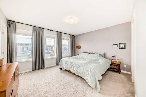 19 Rowley Common Nw, Calgary, AB - Indoor Photo Showing Bedroom