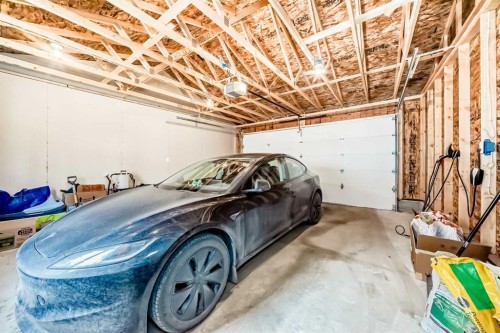 19 Rowley Common Nw, Calgary, AB - Indoor Photo Showing Garage