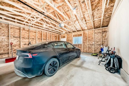19 Rowley Common Nw, Calgary, AB - Indoor Photo Showing Garage