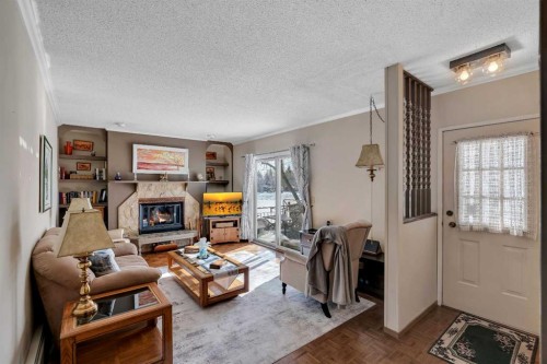 51 Parkwood Crescent, Strathmore, AB - Indoor Photo Showing Living Room With Fireplace