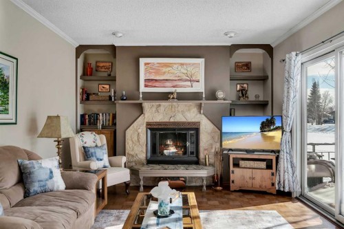 51 Parkwood Crescent, Strathmore, AB - Indoor Photo Showing Living Room With Fireplace