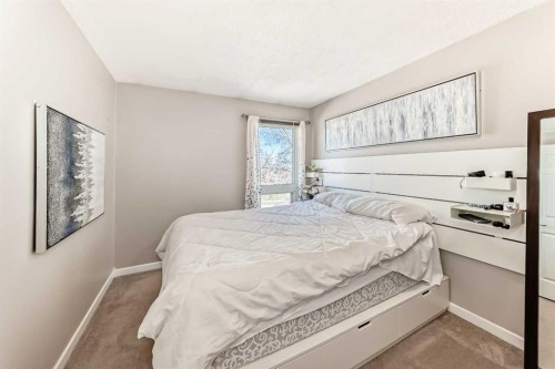 13-1845 Lysander Crescent Se, Calgary, AB - Indoor Photo Showing Bedroom