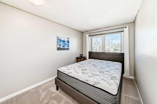 13-1845 Lysander Crescent Se, Calgary, AB - Indoor Photo Showing Bedroom