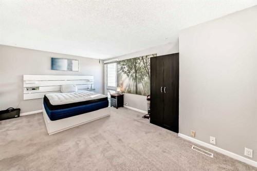 13-1845 Lysander Crescent Se, Calgary, AB - Indoor Photo Showing Bedroom