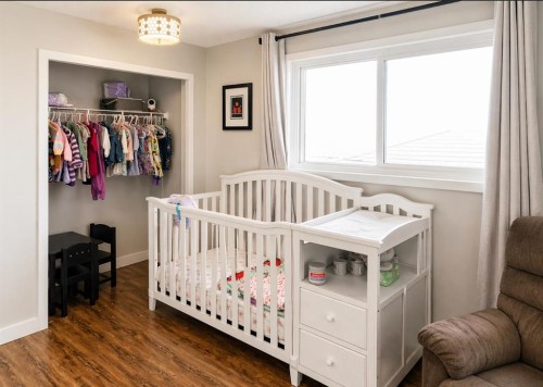 2452 Riverstone Road Se, Calgary, AB - Indoor Photo Showing Bedroom
