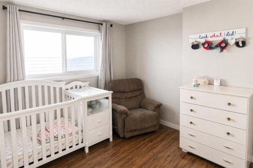 2452 Riverstone Road Se, Calgary, AB - Indoor Photo Showing Bedroom