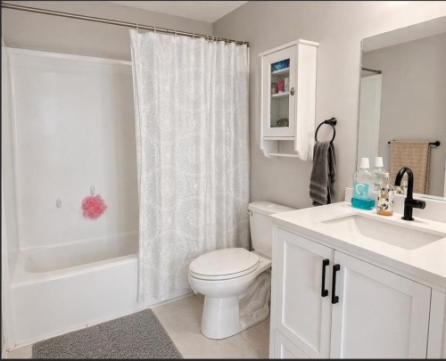 2452 Riverstone Road Se, Calgary, AB - Indoor Photo Showing Bathroom
